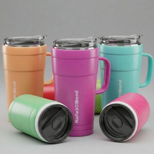 A vibrant studio shot showcases two Nutriblend insulated tumblers on a clean, white background, designed to keep your smoothies at the perfect temperature. The tumbler on the left is a striking teal, while the one on the right features a sleek, stainless steel finish. Both tumblers are tall and cylindrical, with a smooth, matte texture for easy gripping. The camera angle is low, capturing the tumblers from a flattering perspective that emphasizes their modern design and functional appeal. The lighting is soft and even, highlighting the bright colors and smooth textures of the tumblers without harsh shadows.
